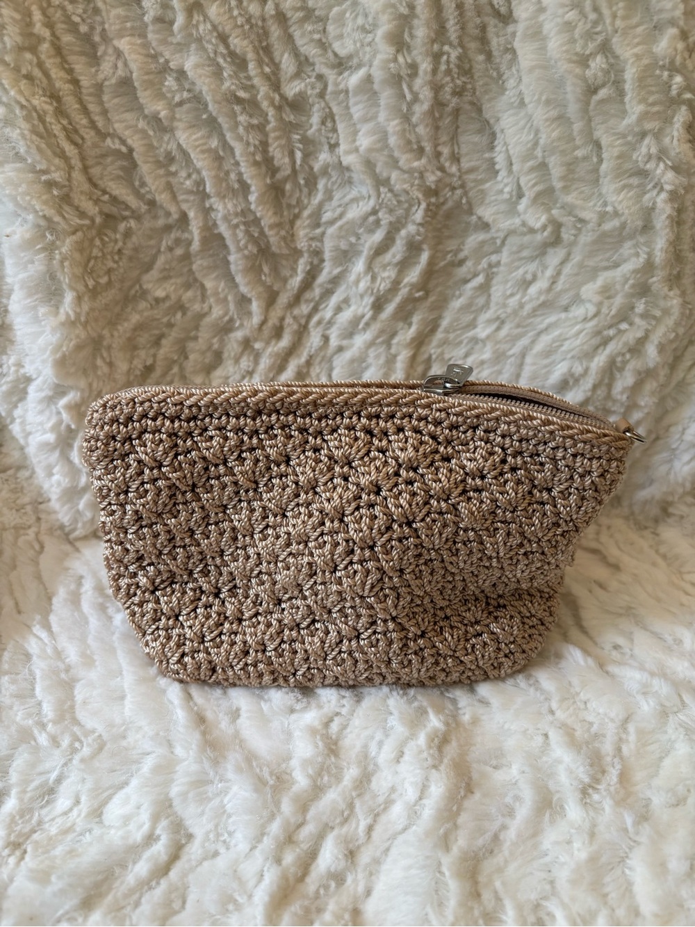 The Sak crochet cosmetic case